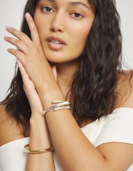 Pulsera UNO DE 50 tres formas orgánicas entrelazadas